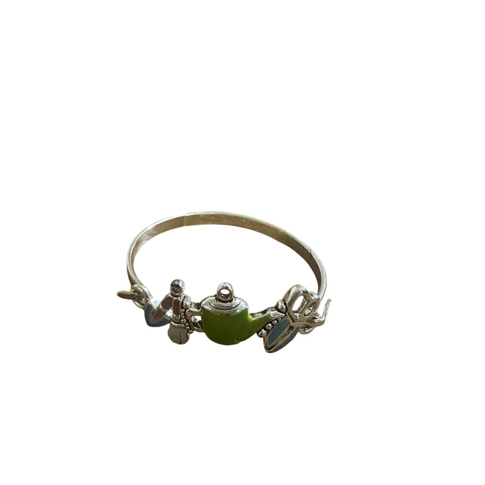 Designer Collection silver tone bracelet with green teapot